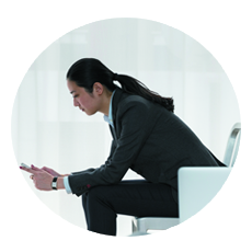 Business woman holding a mobile device